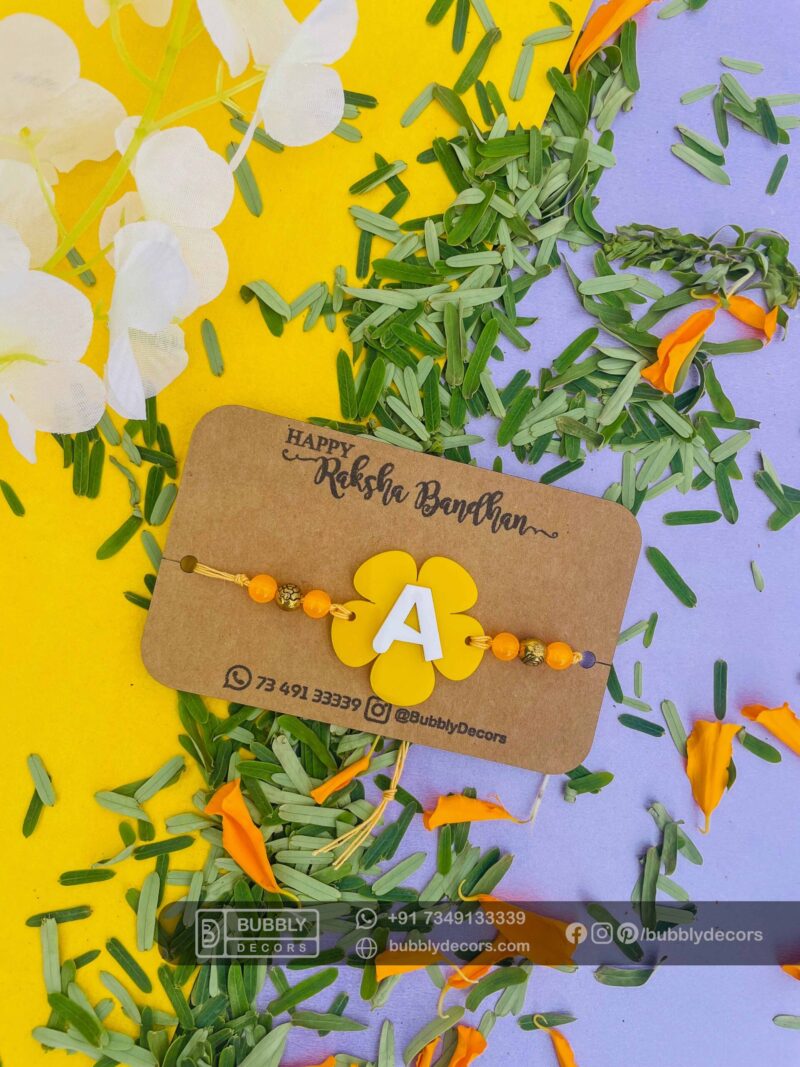 Alphabet flower rakhi - Bubbly Decors