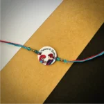 Sister tying rakhi