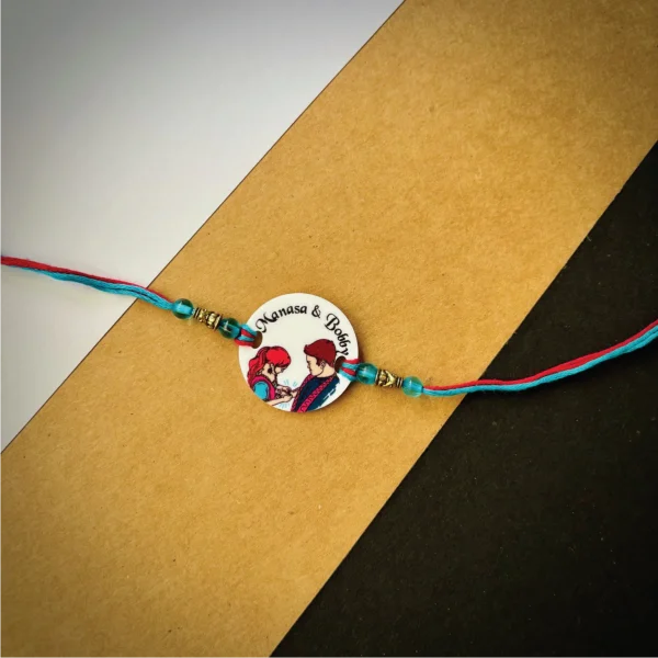 Sister tying rakhi