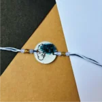 Camera themed painted rakhi