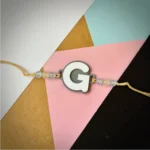 Alphabet rakhi - pink