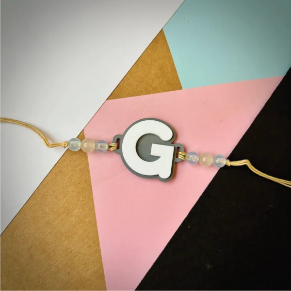 Alphabet rakhi - pink