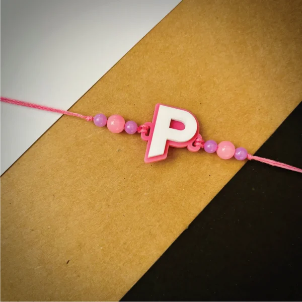 Alphabet rakhi - gray