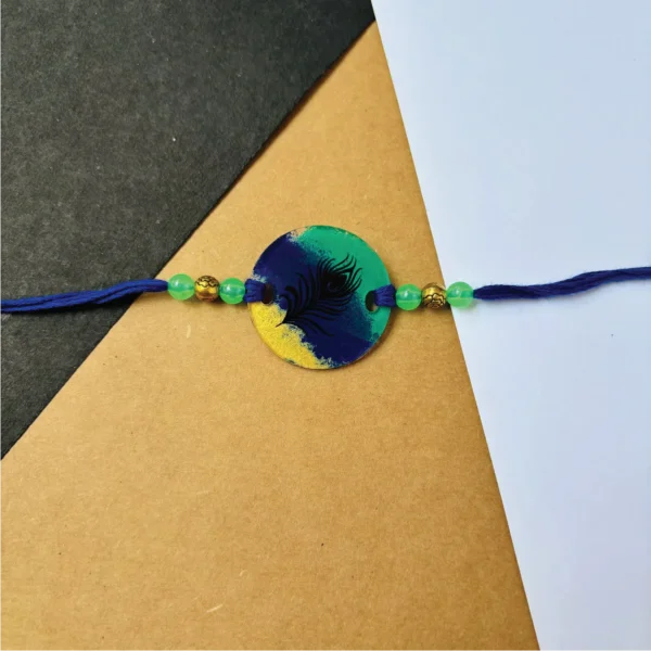 Peacock painted rakhi