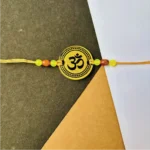 Om gold painted rakhi