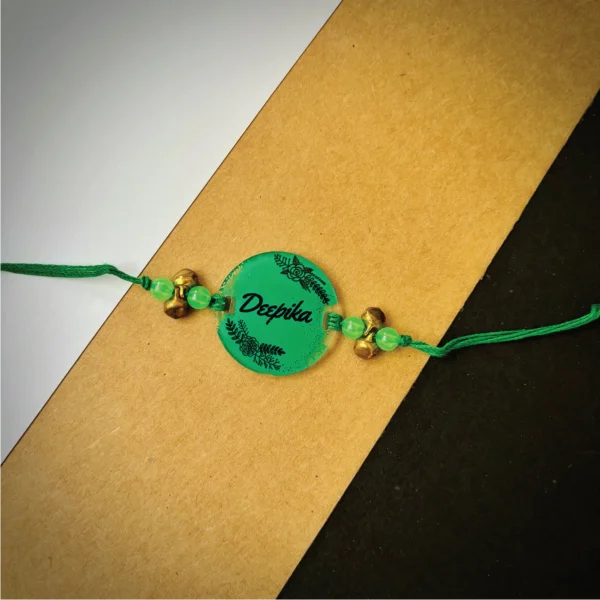 Name painted rakhi -green