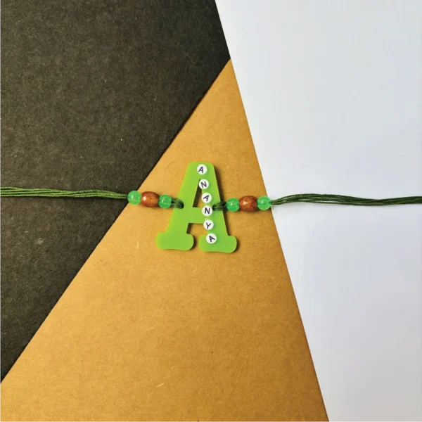 Name on alphabet rakhi - green