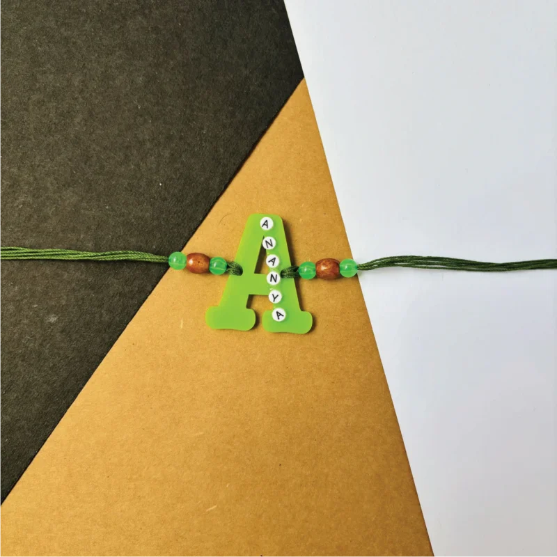 Name on alphabet rakhi - green