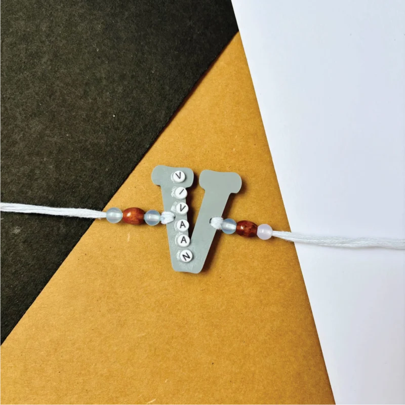 Name on alphabet rakhi - gray