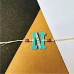 Name on alphabet rakhi - blue