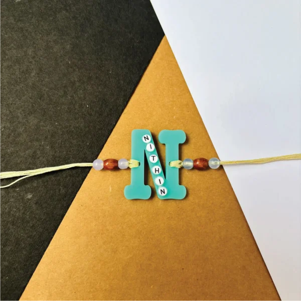 Name on alphabet rakhi - blue