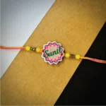 Mandala printed name rakhi - green/pink