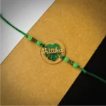 Gold name on leaf printed rakhi