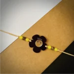Flower smiley rakhi - black