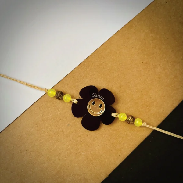 Flower smiley rakhi - black