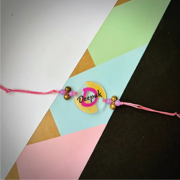 Designer name with alphabet rakhi -pink