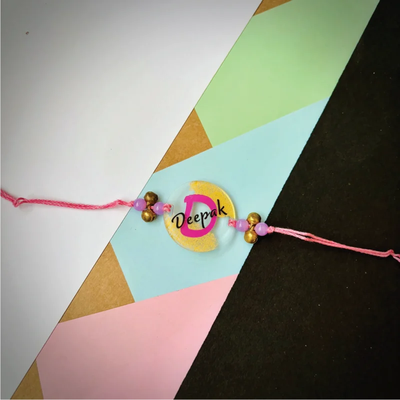Designer name with alphabet rakhi -pink